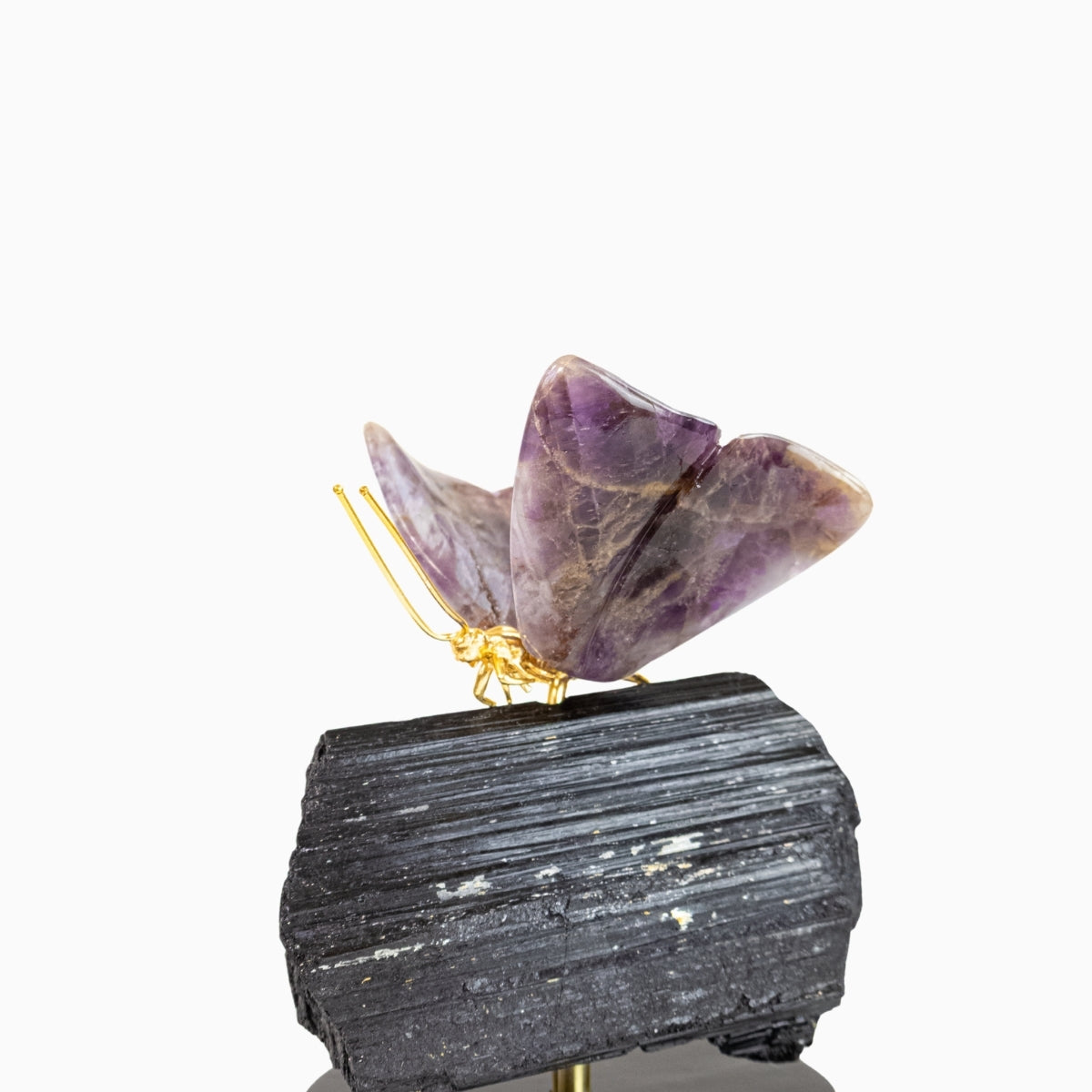 Borboleta Esculpida em Super Seven na Base de Turmalina Negra 1,654 kg