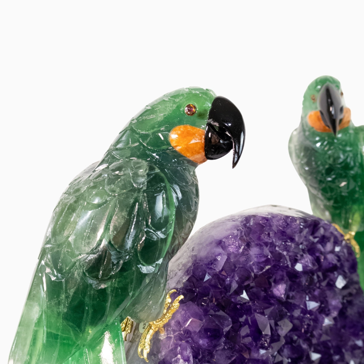 Casal de Araras Esculpido em Fluorita Verde na Drusa de Ametista na Base giratória de mármore negro 15,600 kg